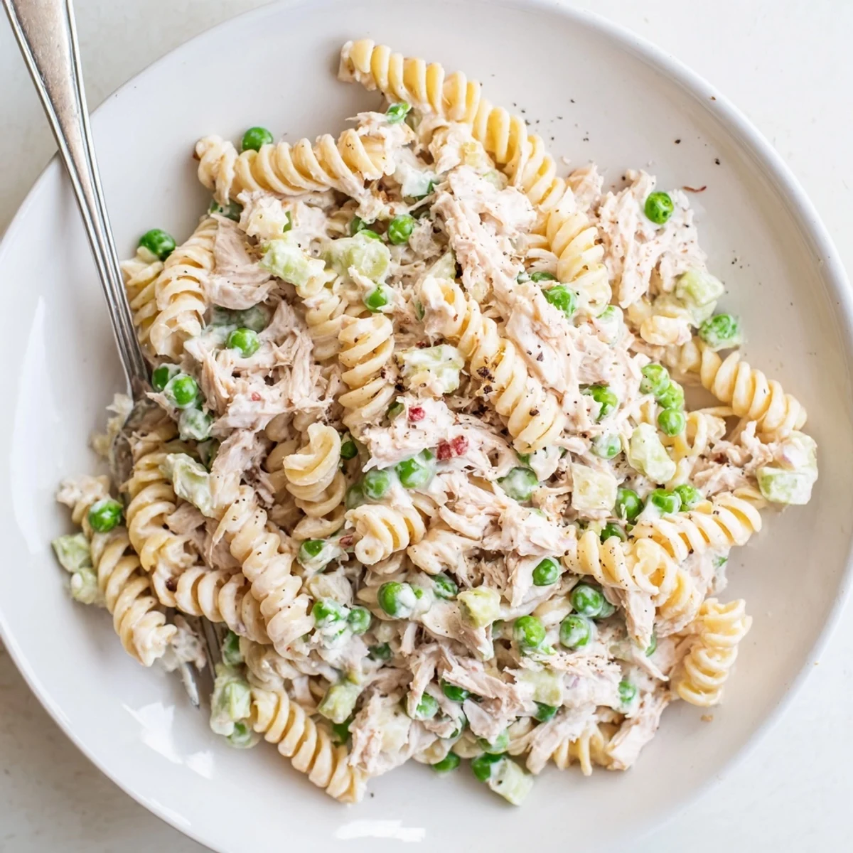 Refreshing tuna pasta salad ideal for outdoor picnics or casual lunches.  
