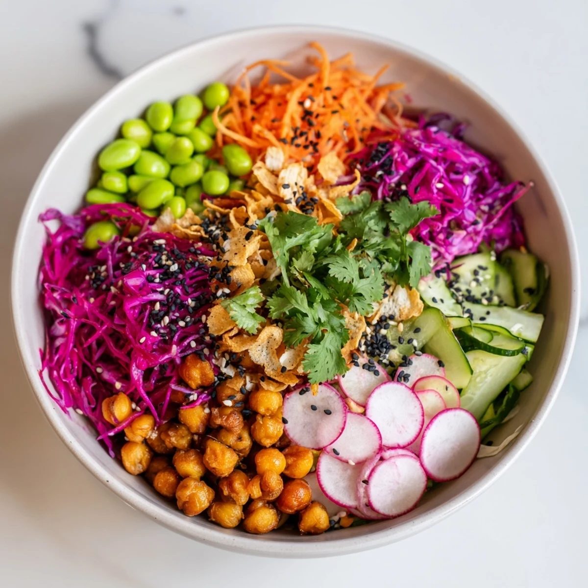 Delicious ASMR Crunch Snack Bowls topped with roasted chickpeas and drizzled with sriracha mayo.