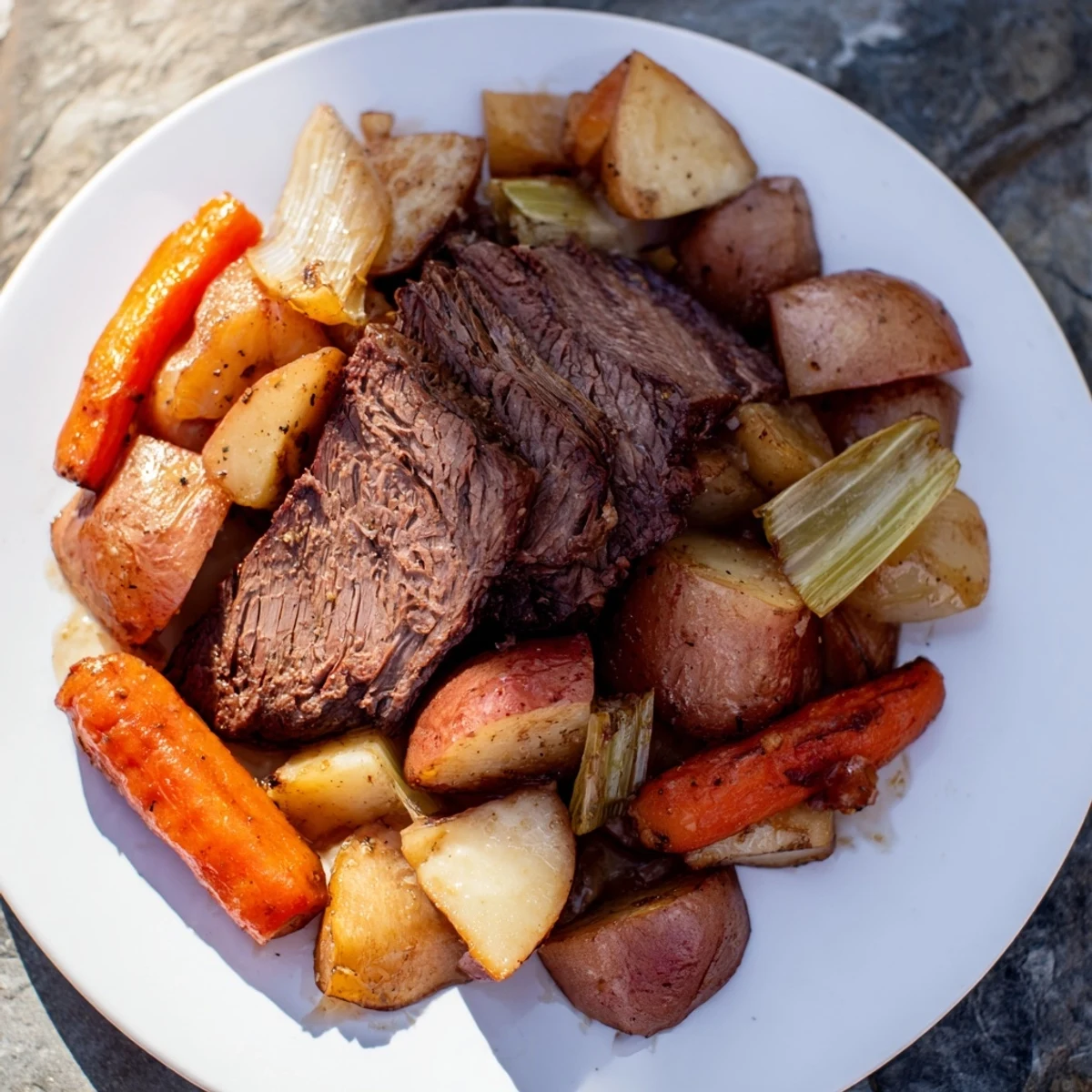 A close-up shot of the incredibly flavorful Sunday Pot Roast, showcasing soft, slow-cooked beef and veggies.