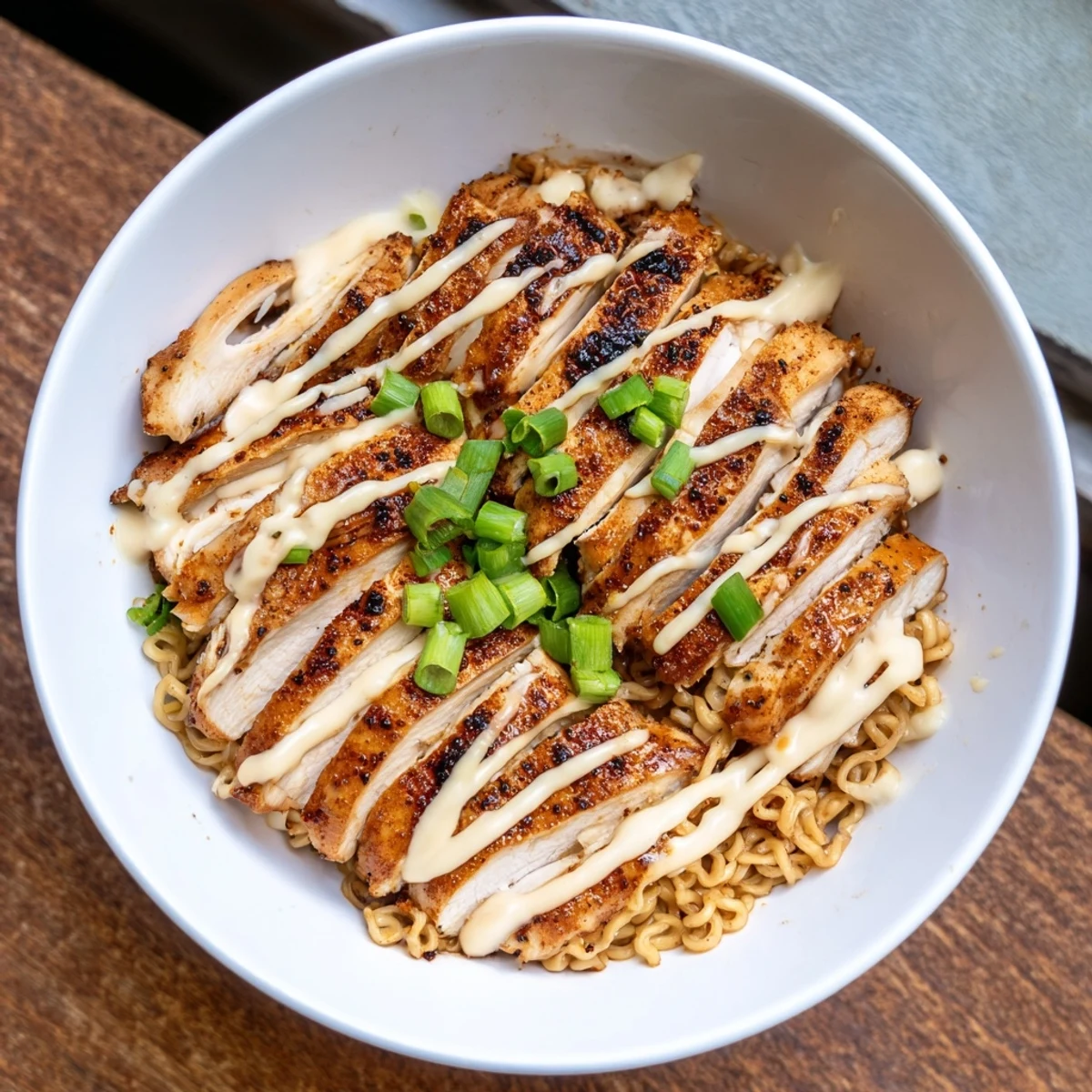 A close-up of flavorful Fiery Chicken Ramen, showcasing the rich broth and perfectly cooked ramen noodles.