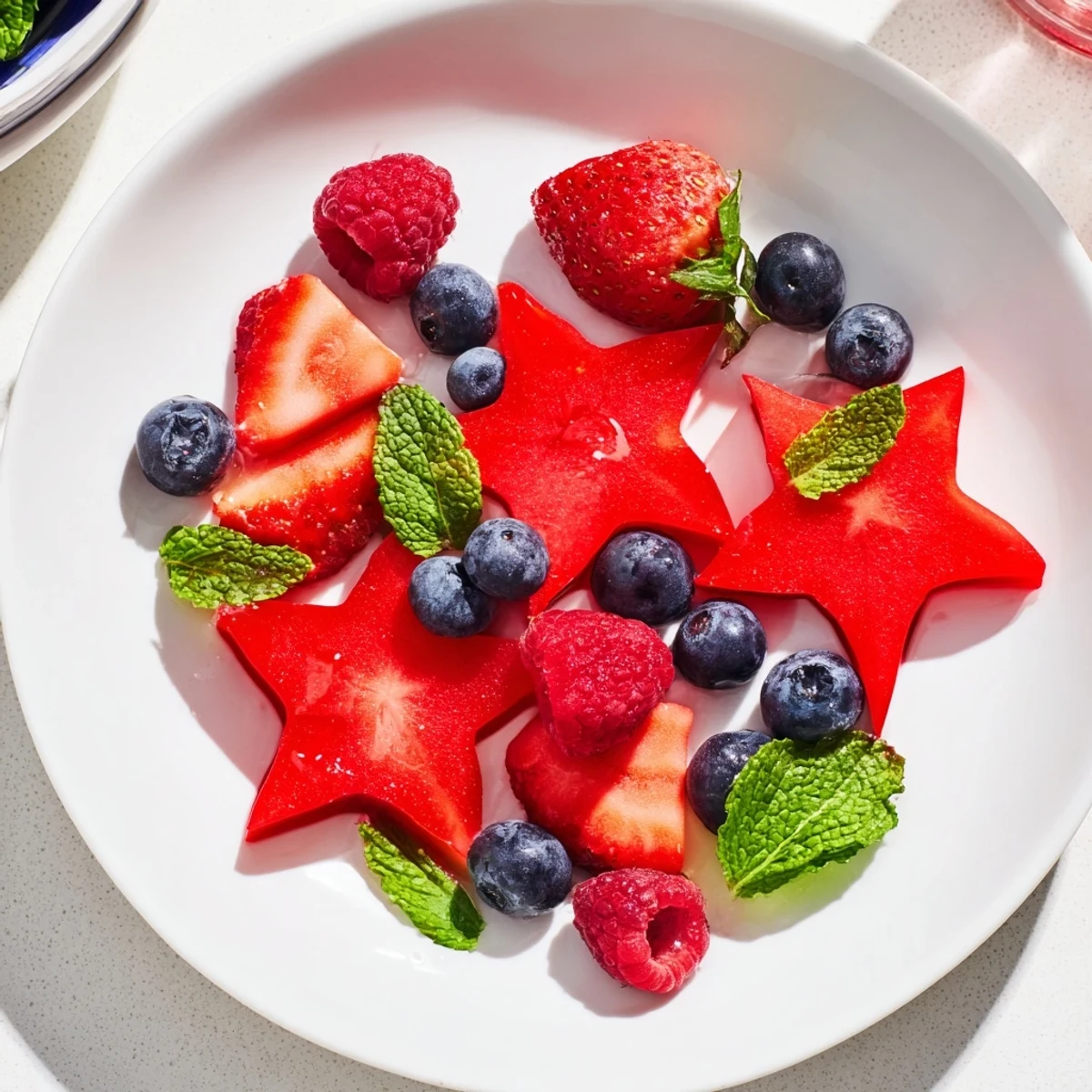 A colorful Starfruit and Berry Platter, a refreshing vegan snack ready in minutes.
