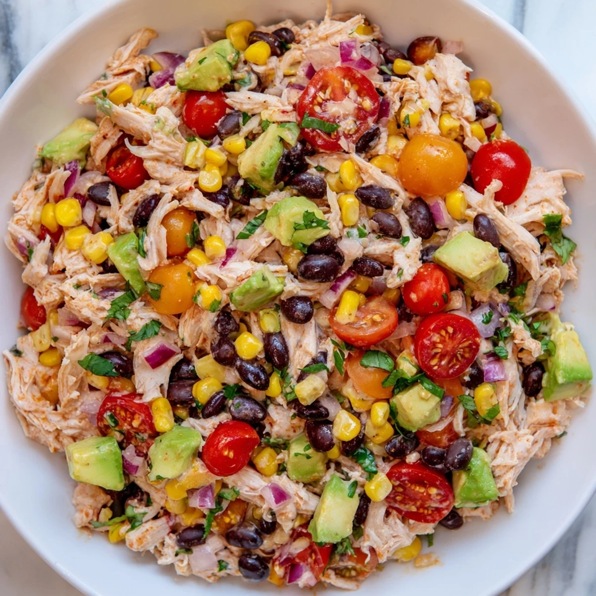 Hearty and delicious Dense Southwestern Bean Salad, the perfect dish for a summer gathering with friends.
