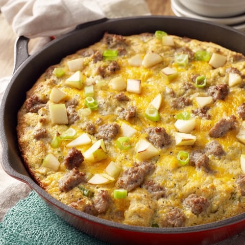 Golden, bubbly Savory Apple, Sausage, and Cheddar Scone Skillet, perfect for a cozy, delicious brunch.
