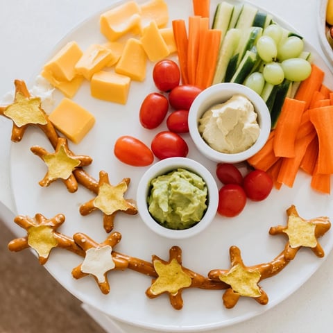 Kids Snack Adventure Map featuring colorful veggies, cheese shapes, pretzel paths, and yummy dips.