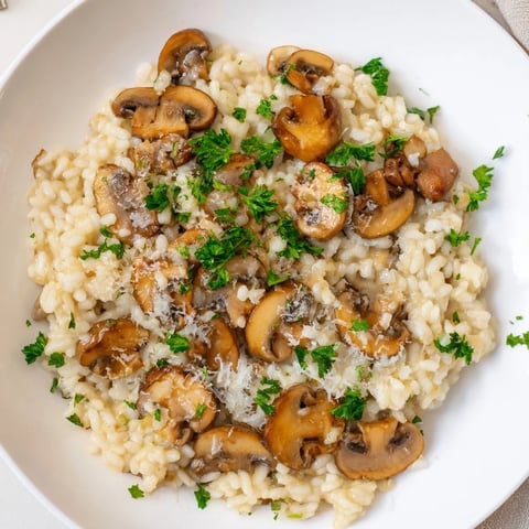 Creamy mushroom risotto, a golden, comforting Italian rice dish ready to serve.