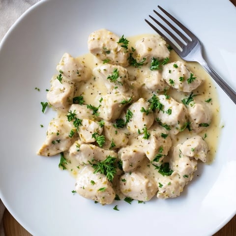 Juicy Creamy Garlic Chicken Bites simmered in a velvety, aromatic sauce, ready to serve over fluffy mashed potatoes or pasta.