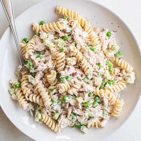 Refreshing tuna pasta salad ideal for outdoor picnics or casual lunches.  