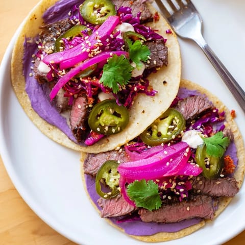 Colorful bowls of Global Street-Food Fusion mixed with savory proteins and bold flavors.  