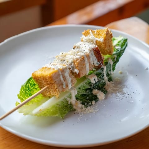 Delicious Chicken Caesar Salad Skewers, ready to be enjoyed with their vibrant, fresh ingredients.