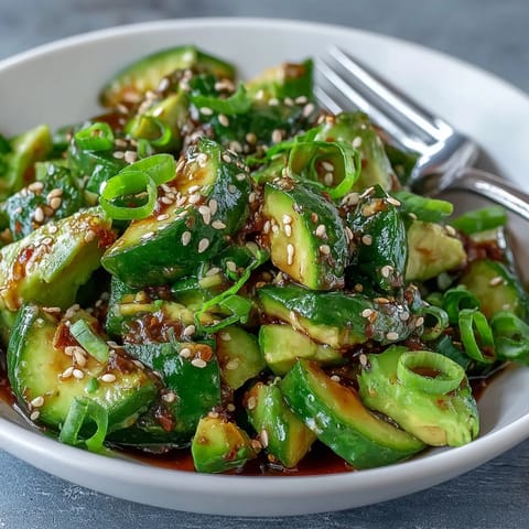 Vibrant Smashed Cucumber and Avocado Salad with Sesame, a perfect light lunch.